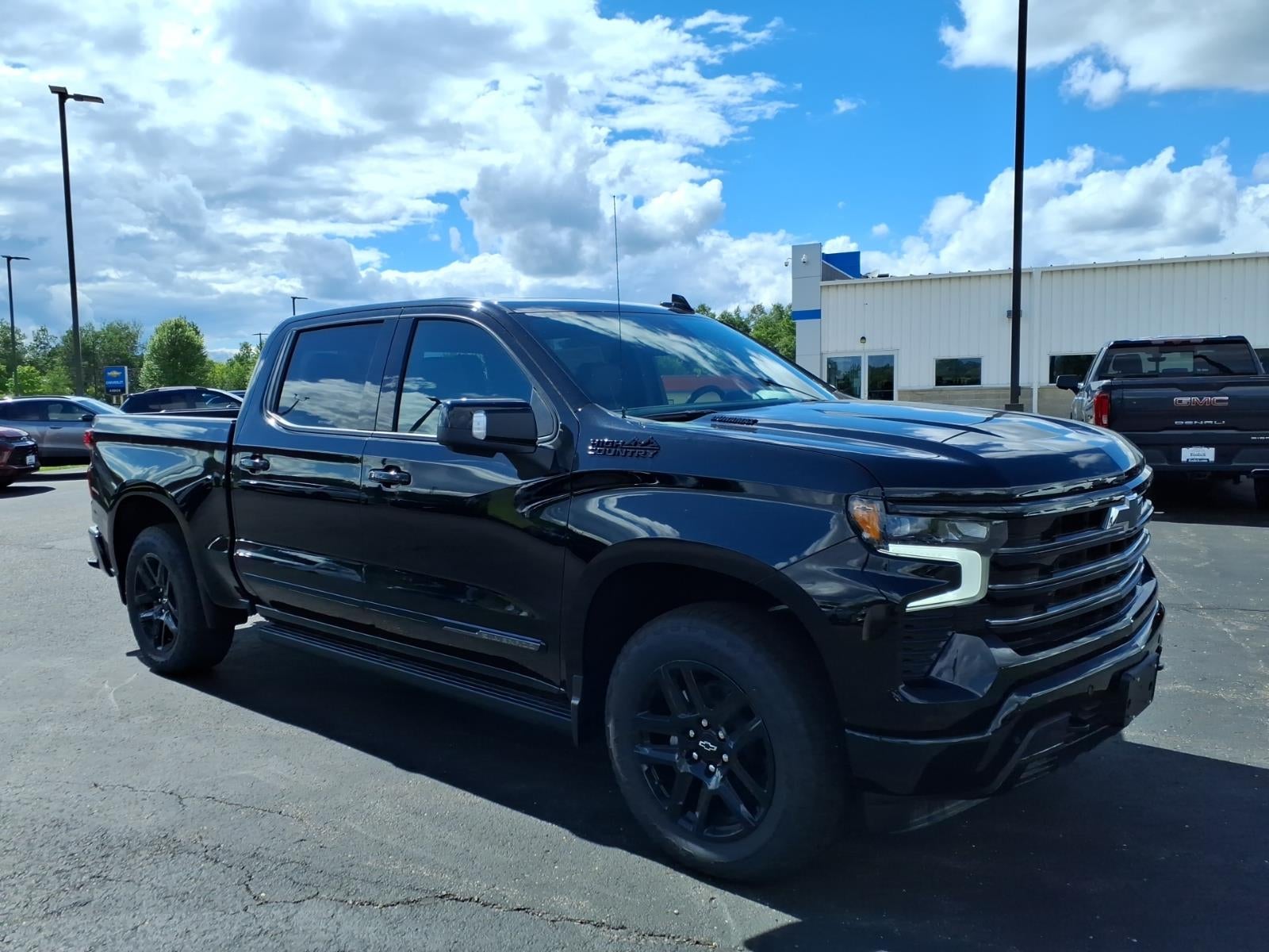 2026 Chevrolet Silverado 1500 High Country in Black — front three-quarter view