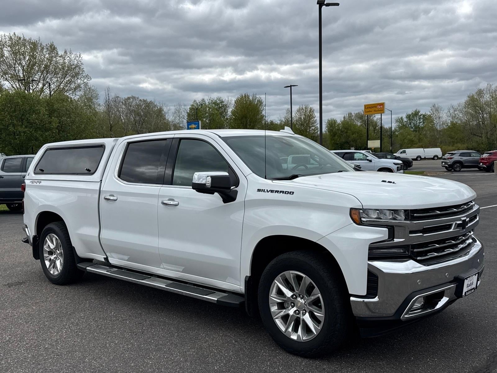 2019 Chevrolet Silverado 1500 LTZ in Summit White — front three-quarter view