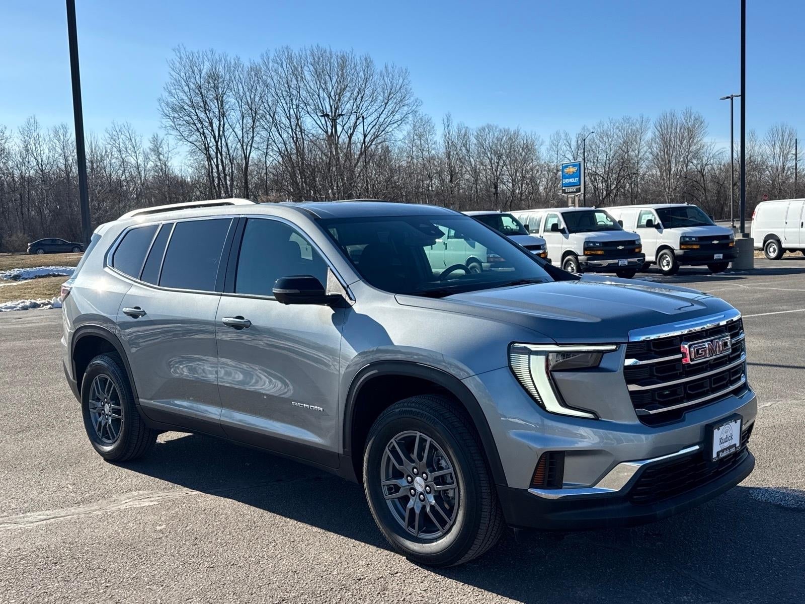 2025 GMC Acadia Elevation in Sterling Metallic — front three-quarter view