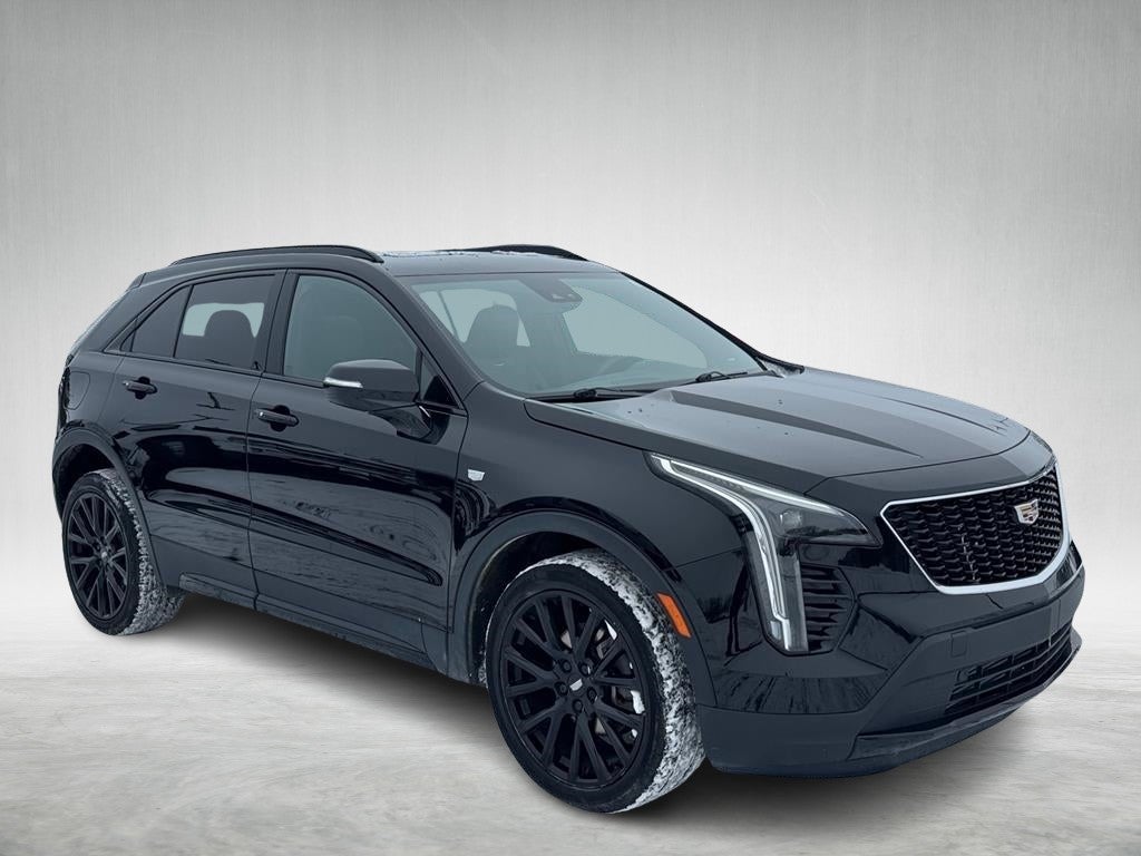 2023 Cadillac XT4 Sport in Stellar Black Metallic — front three-quarter view