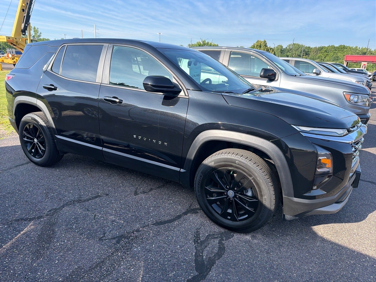 2025 Chevrolet Equinox LT in Mosaic Black Metallic — front three-quarter view
