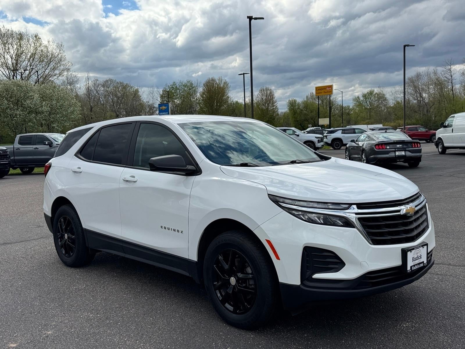 2023 Chevrolet Equinox LS in Summit White — front three-quarter view